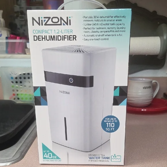 Compact 1.2-Liter White Dehumidifier - Picture 1 of 4
